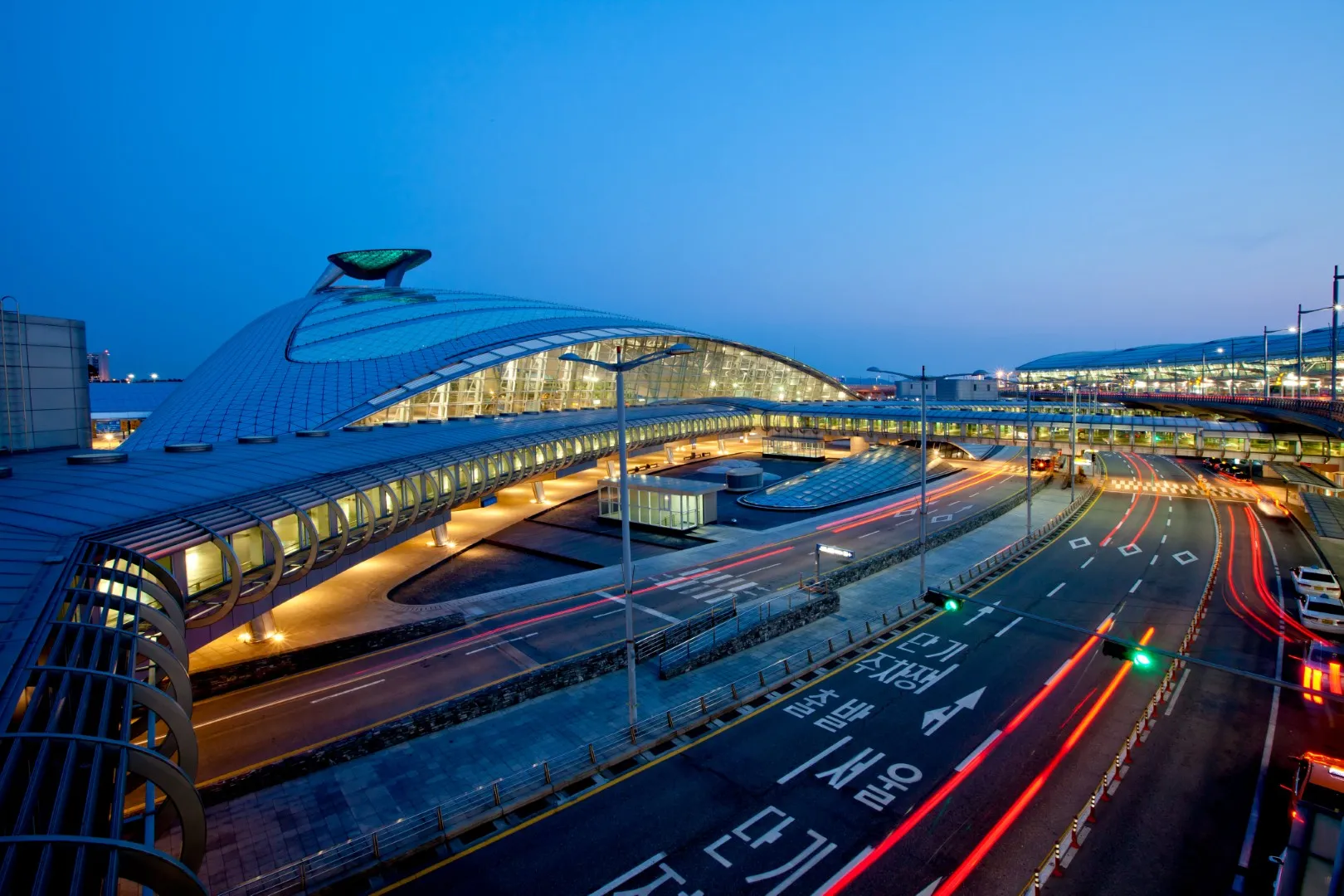 Incheon International Airport (ICN) Terminal 1 exterior at dusk