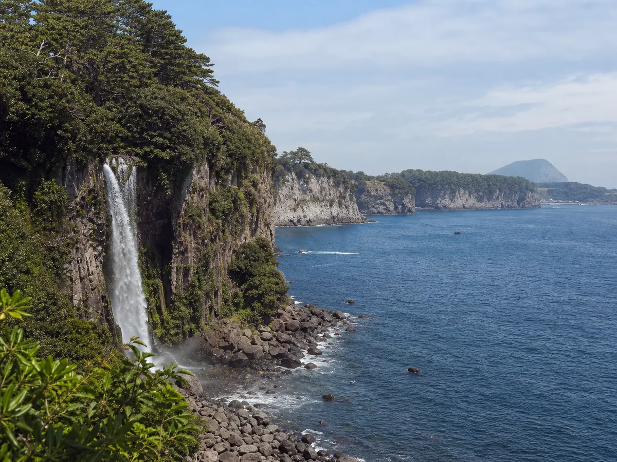 Seogwipo coastal cliffs and waterfall, Jeju